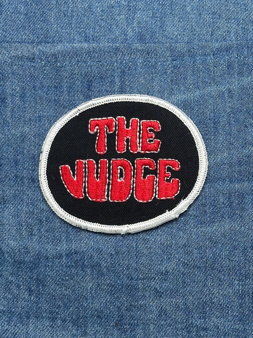 The Judge Patch: Red on Black Oval - Novelty Accessory