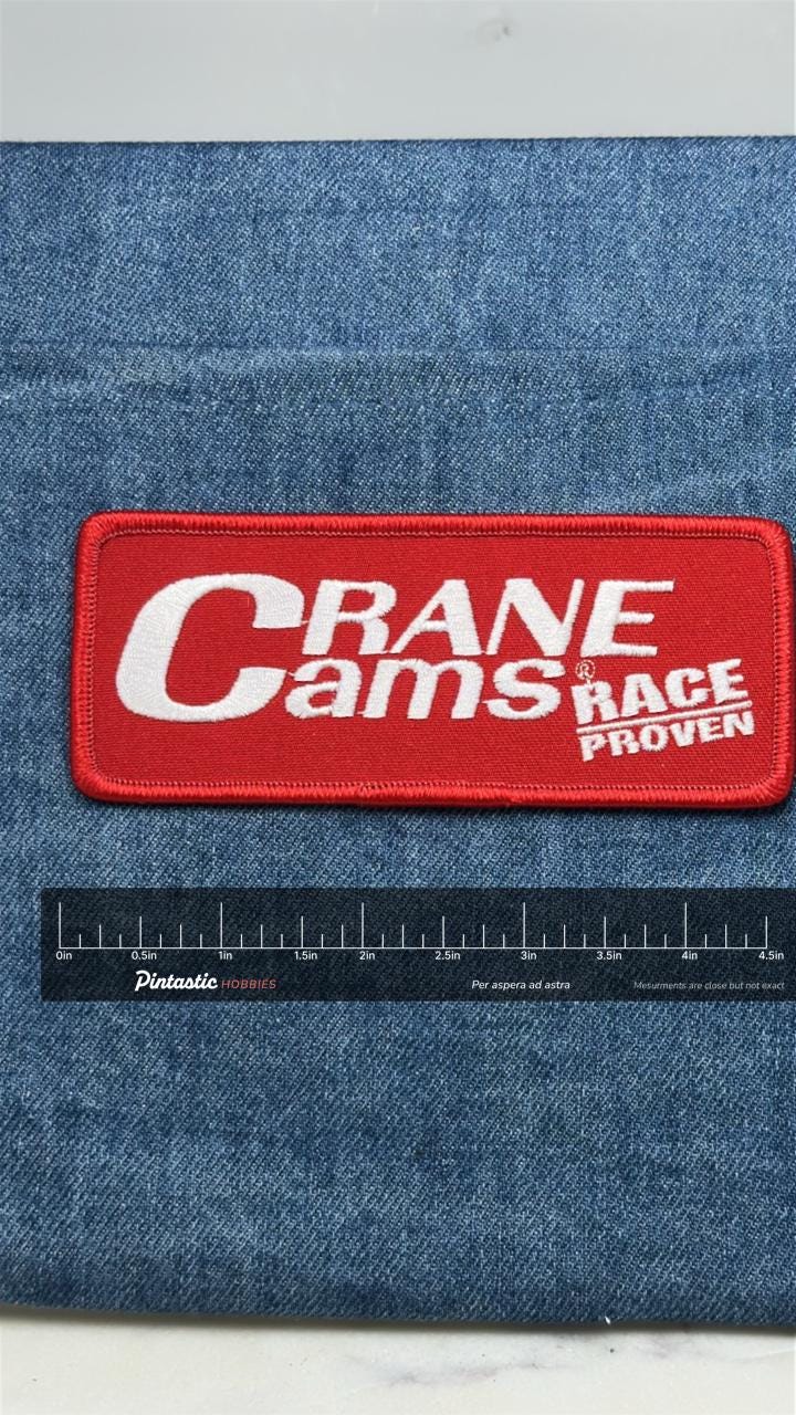 Crane Cams Patch: Red White Logo - Racing Accessory with ruler overlay for size reference