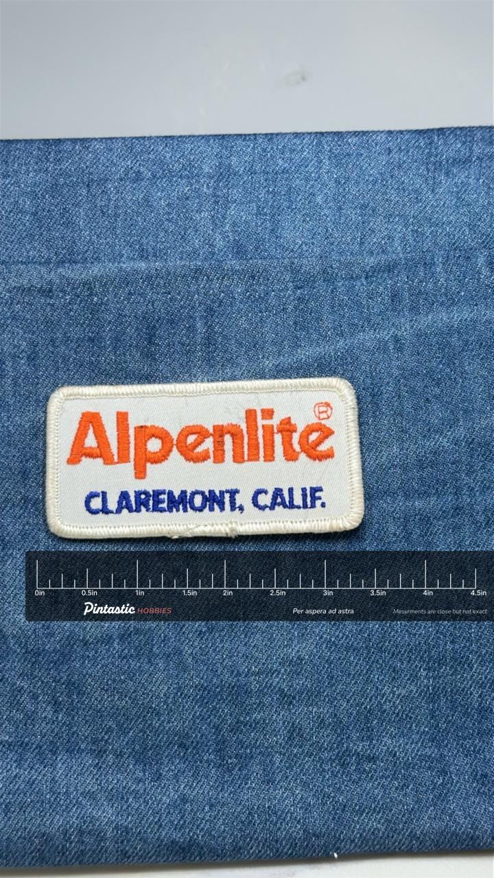 Alpenlite Patch: Orange & Blue Logo - RV Brand Accessory with ruler overlay for size reference