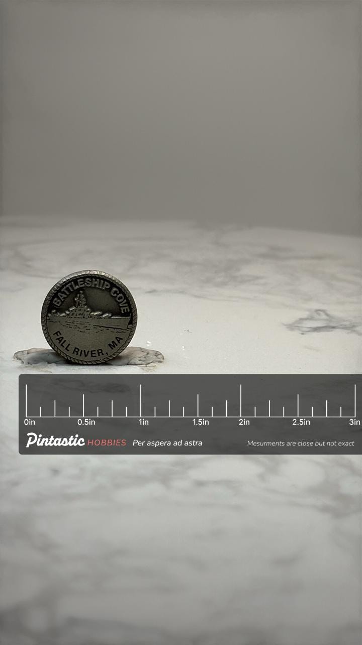 Battleship Cove Souvenir Pin: Silver Tone - Fall River MA with ruler overlay for size reference