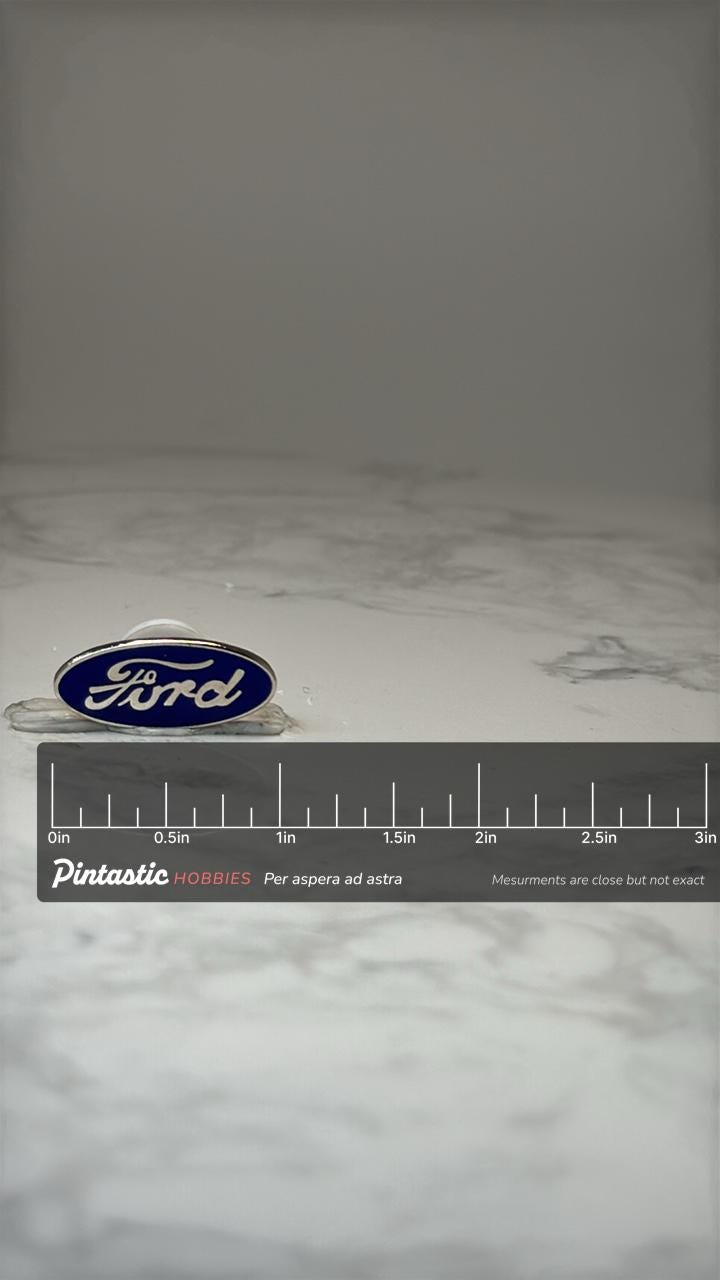 Ford Logo Enamel Pin: Blue Oval Silver Tone - Auto Brand Accessory with ruler overlay for size reference