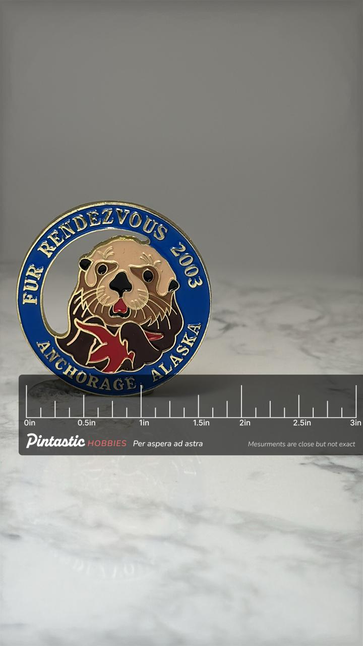 Anchorage Alaska Fur Rendezvous Pin: Enamel Blue 2003 Souvenir with ruler overlay for size reference