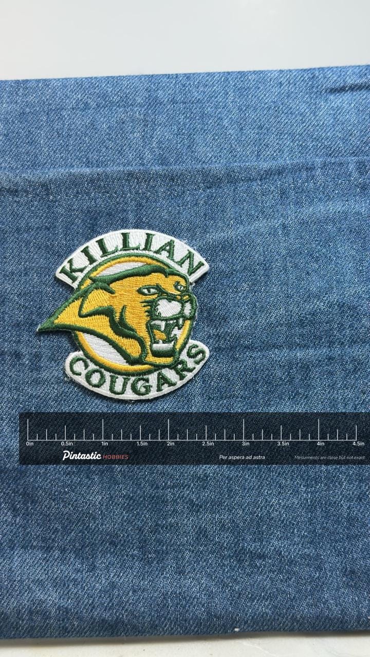 Killean Cougars Patch: Green & Gold - School Mascot Accessory with ruler overlay for size reference