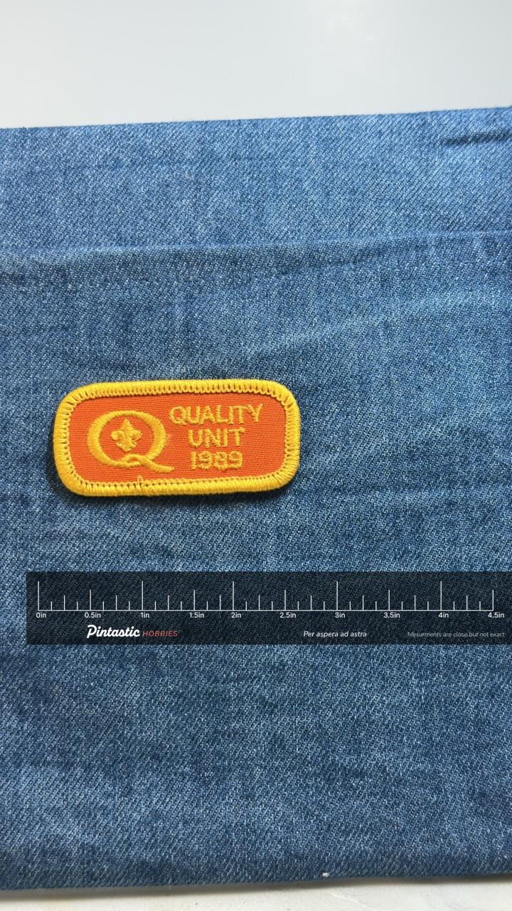 Quality Unit 1989 Patch: Orange & Gold - Vintage Accessory with ruler overlay for size reference