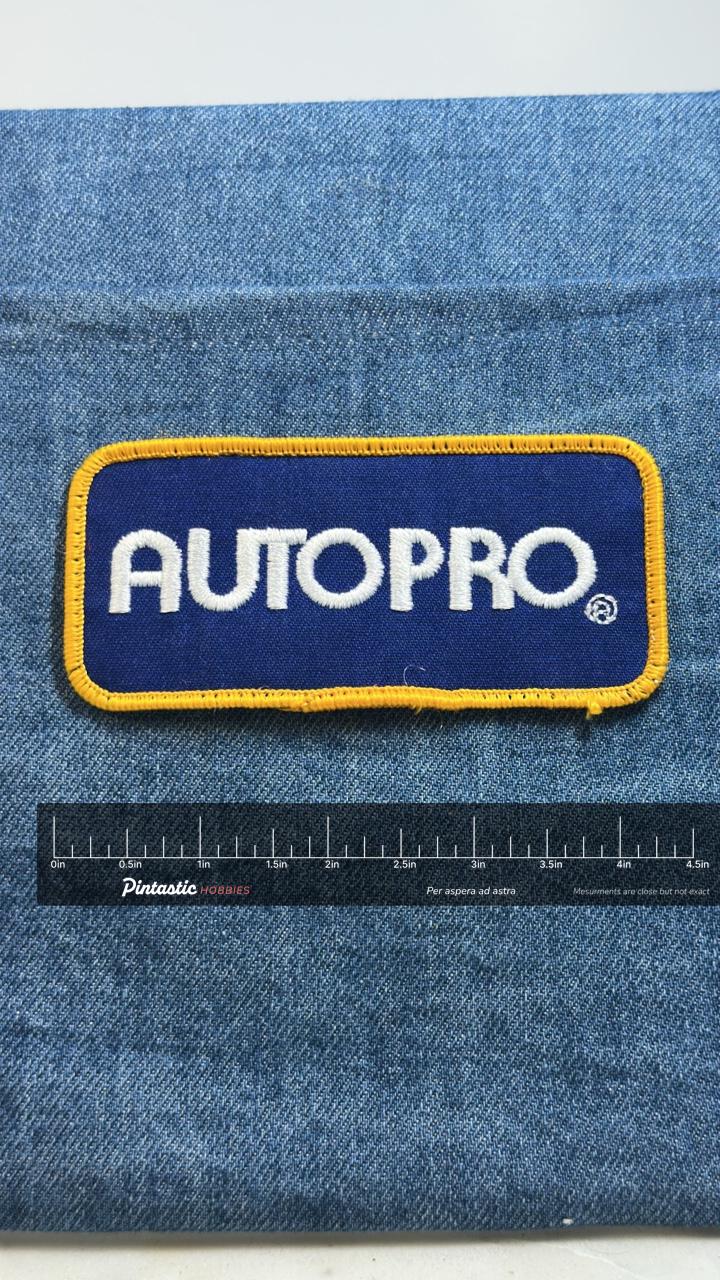 Autopro Patch: Blue & Yellow Border - Auto Service Accessory with ruler overlay for size reference