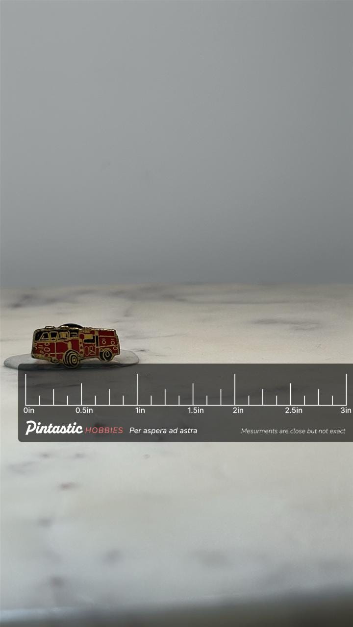 Vintage Fire Truck Enamel Pin: Red Gold Tone - Retro Rescue Accessory with ruler overlay for size reference