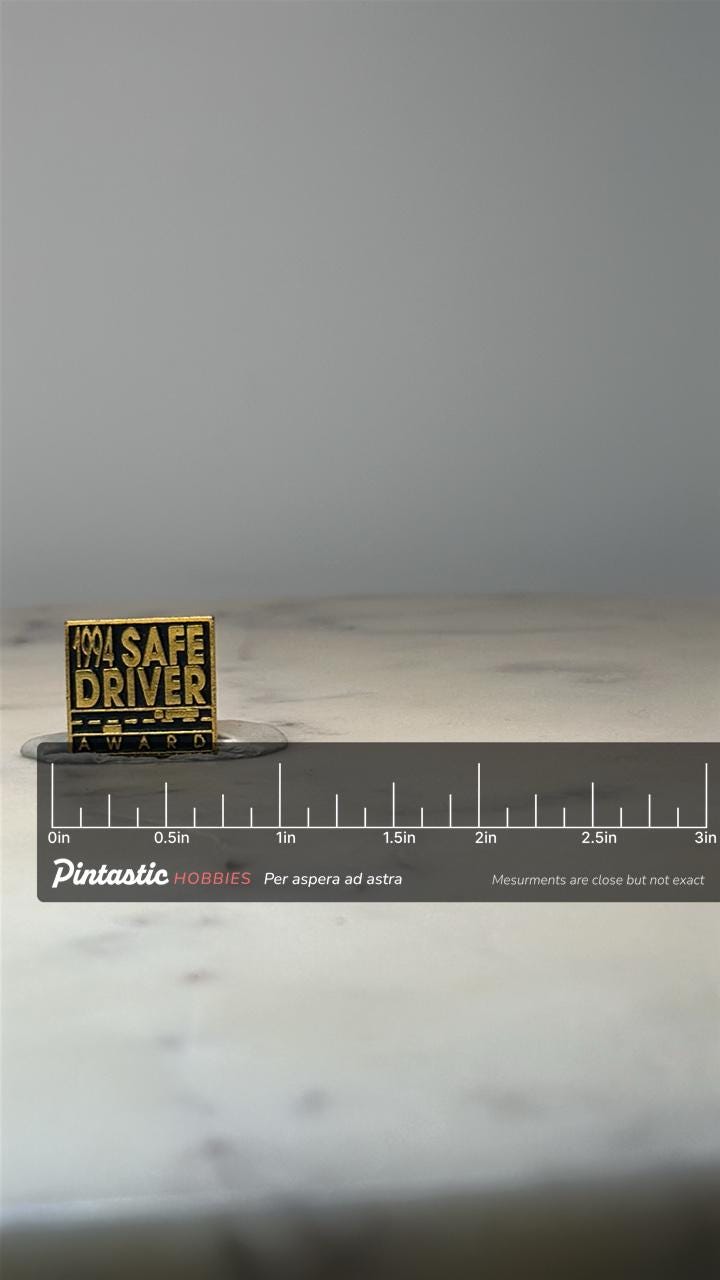 1994 Safe Driver Award Pin: Gold Tone Enamel - Road Safety with ruler overlay for size reference