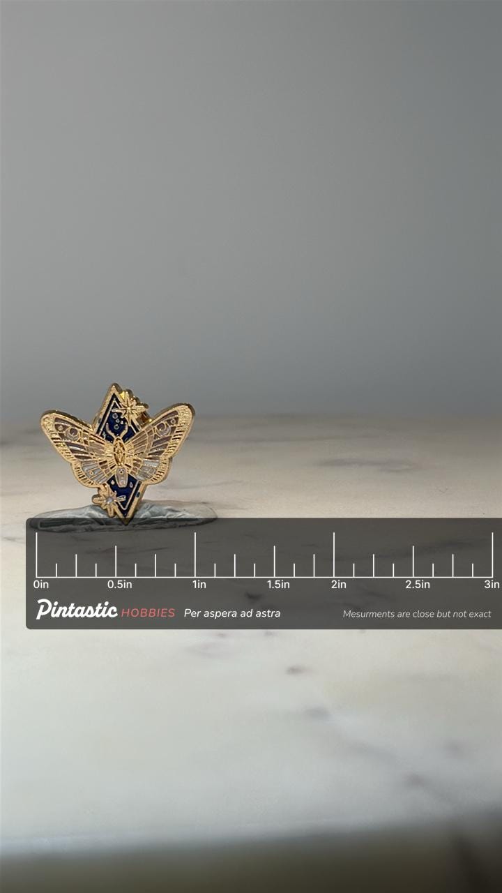 Gold Tone Cosmic Butterfly Pin Celestial Moth Star Enamel Lapel Pin with ruler overlay for size reference