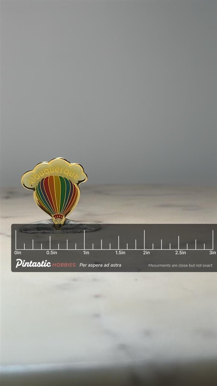 Albuquerque Hot Air Balloon Pin: Gold Tone Enamel - Travel Souvenir with ruler overlay for size reference