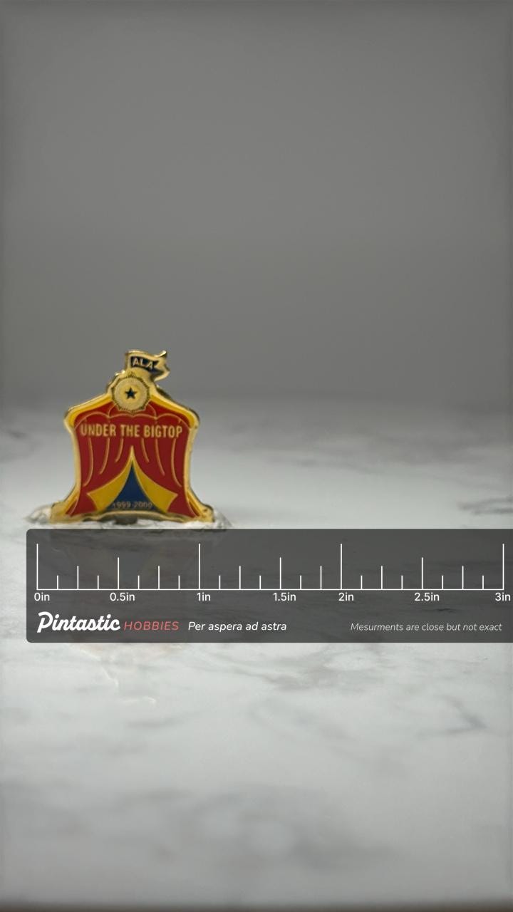 American Legion Auxiliary Pin ALA Under The Big Top 1999 2000 Enamel Pin with ruler overlay for size reference
