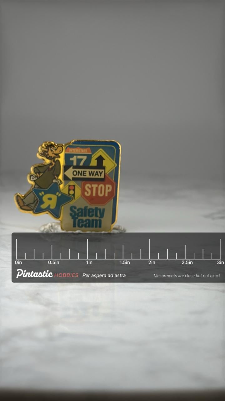 Toys R Us Safety Team Character Pin: Gold Enamel - 1990s Store Award with ruler overlay for size reference