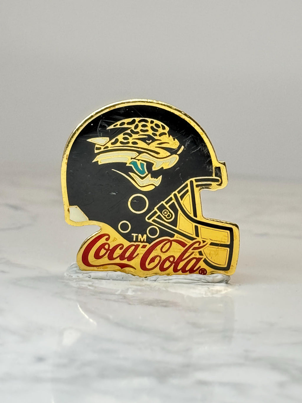 Jacksonville Jaguars Helmet Pin: Gold Tone Enamel - NFL Coca Cola