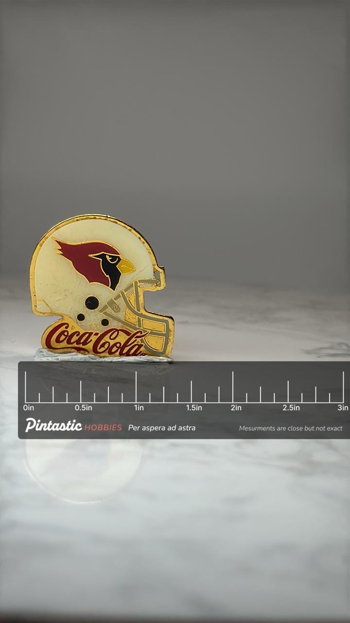Arizona Cardinals Helmet Pin: Red Gold Enamel - NFL Coca Cola Promo with ruler overlay for size reference