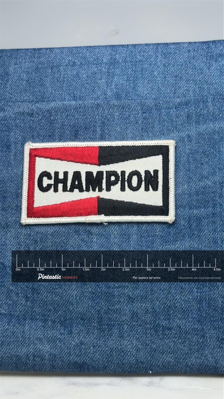 Champion Logo Patch: Red White Black - Vintage Sportswear Accessory with ruler overlay for size reference