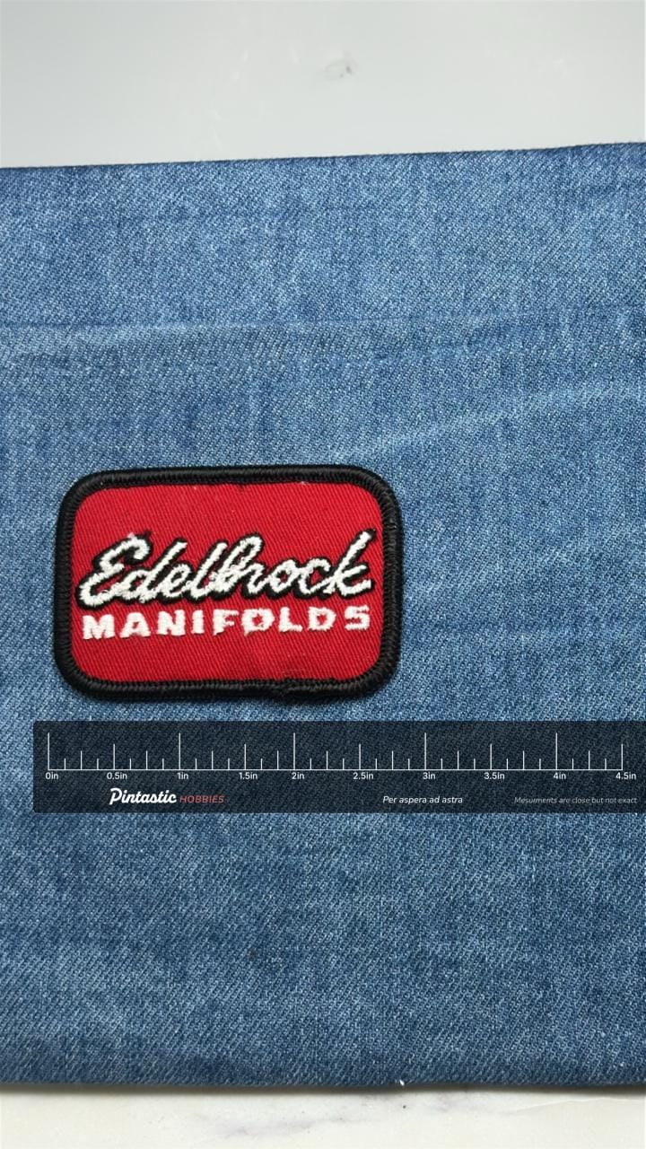 Edelbrock Manifolds Patch: Red Black Script - Racing Accessory with ruler overlay for size reference