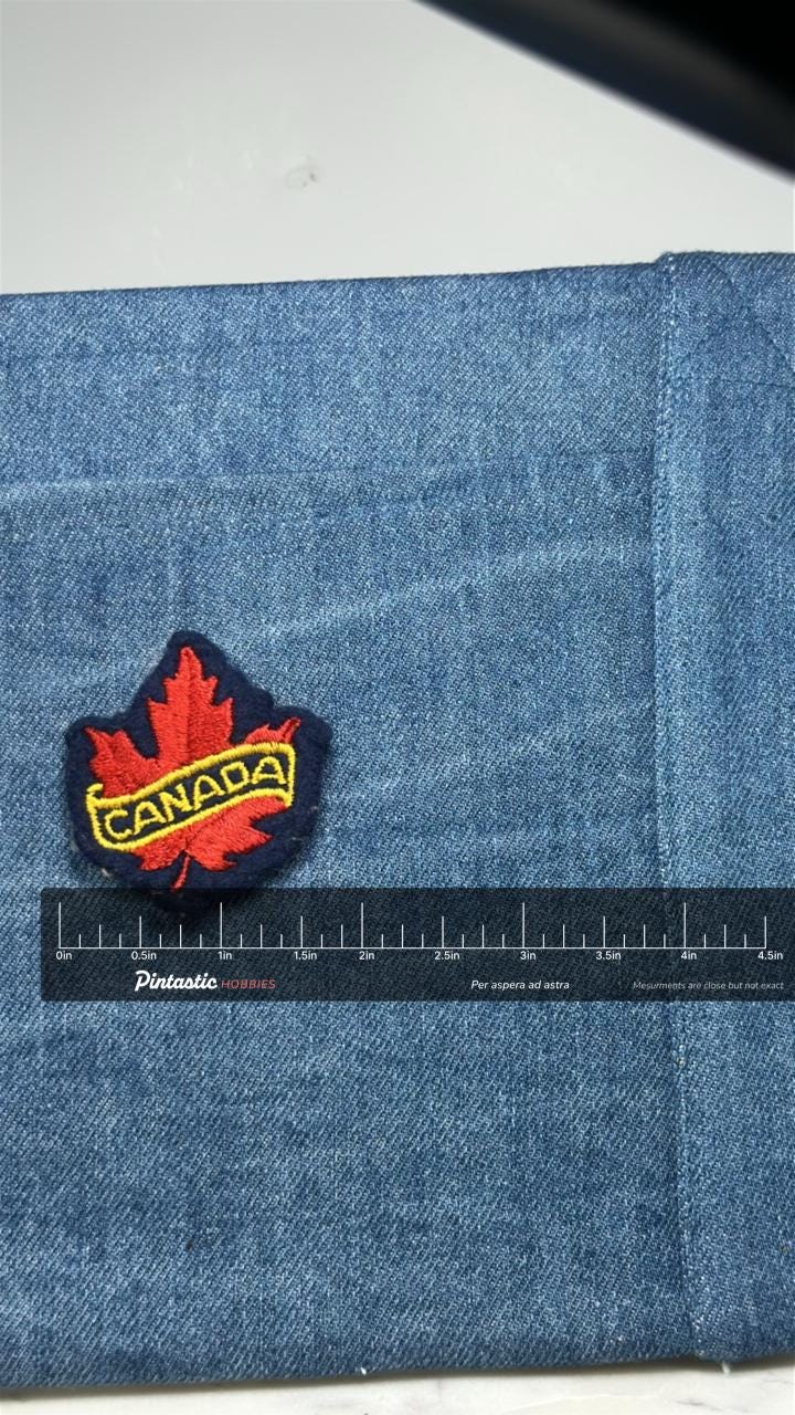 Canada Maple Leaf Patch: Red & Gold - Patriotic Accessory with ruler overlay for size reference