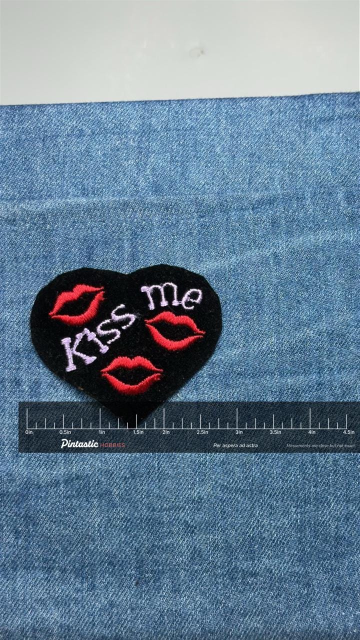 Kiss Me Lips Patch: Black Heart - Retro Love Accessory with ruler overlay for size reference