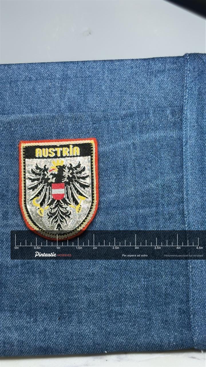 Austria Crest Patch: Gold Border Shield - European Travel Accessory with ruler overlay for size reference