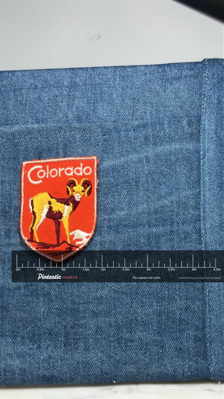 Colorado Bighorn Sheep Patch: Red Shield - State Souvenir Accessory with ruler overlay for size reference