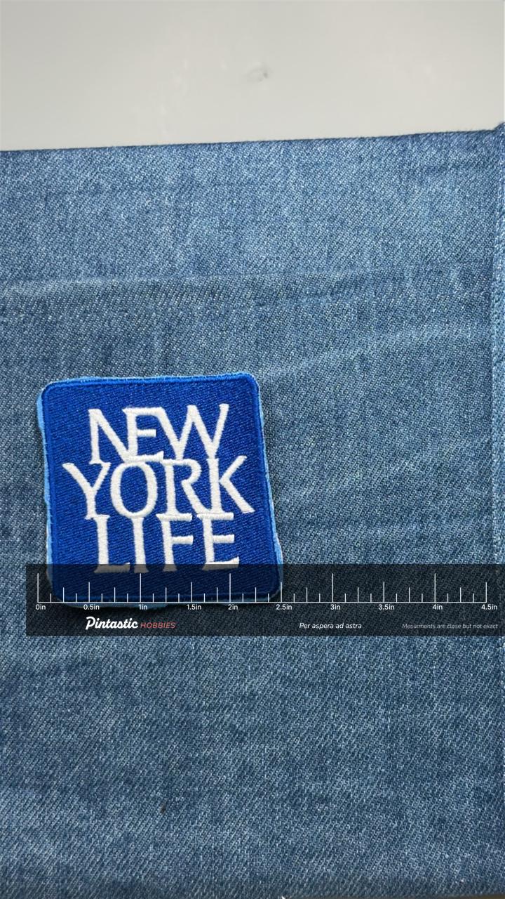 New York Life Patch: Blue & White Square - Insurance Company Accessory with ruler overlay for size reference