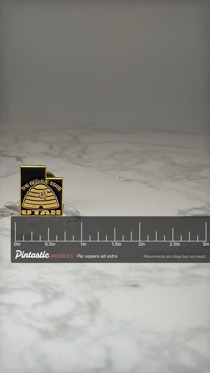 Utah Beehive State Lapel Pin: Black & Gold Enamel - State Souvenir Accessory with ruler overlay for size reference