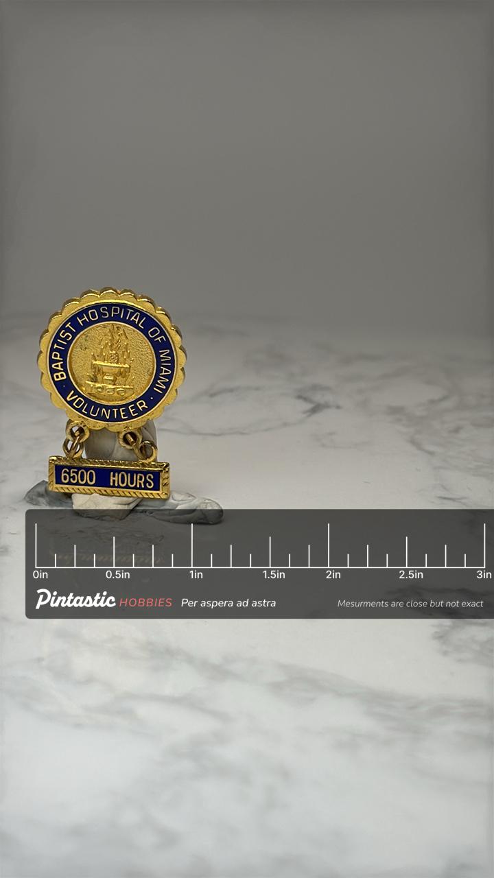 Baptist Hospital of Miami Volunteer Pin: Gold Tone - 6500 Hours with ruler overlay for size reference
