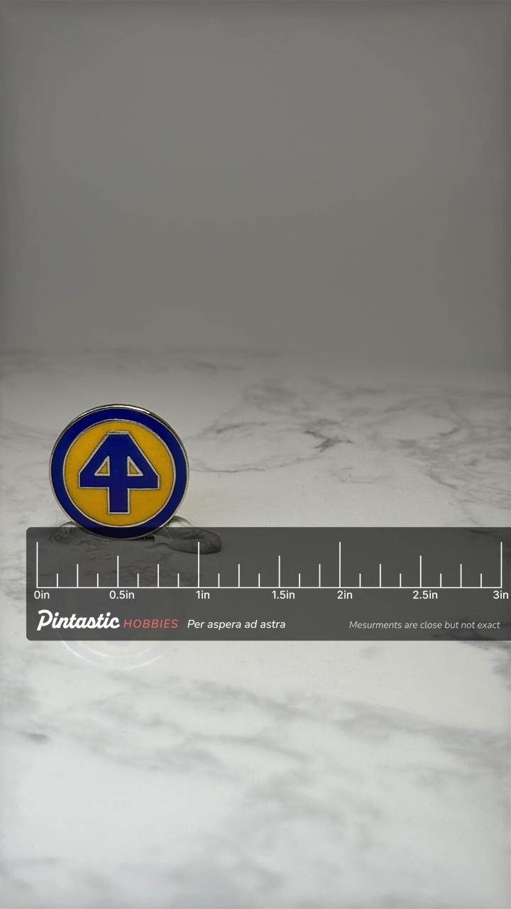 Vintage 44th Infantry Division Military Enamel Lapel Pin Blue Yellow Army Crest with ruler overlay for size reference